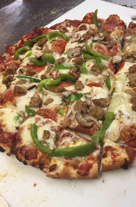 A freshly made pizza from Hering's Towne Inn